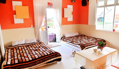 Habitación cuádruple de diseño, 2 camas de matrimonio, vistas al jardín