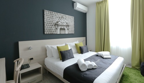 Habitación clásica con 1 cama doble o 2 individuales, baño privado