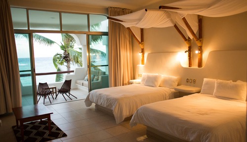 Suite estudio, 2 camas de matrimonio, vistas al mar, frente al mar