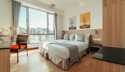 Habitación Premier con 1 cama doble o 2 individuales, 2 camas individuales, vistas parciales al mar