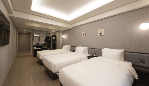 Habitación triple Deluxe
