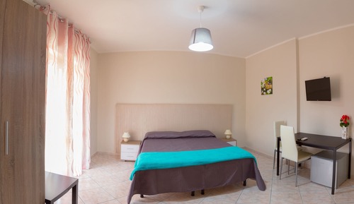 Habitación con 1 cama doble o 2 individuales (Orchidea)