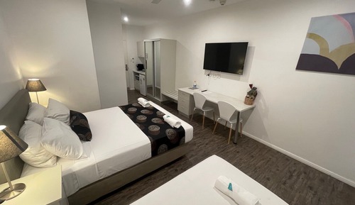 Habitación Deluxe con 1 cama doble o 2 individuales, baño privado