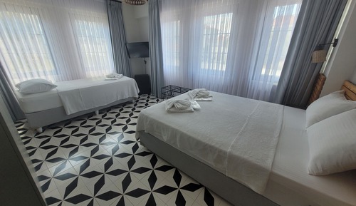 Habitación triple Confort, varias camas