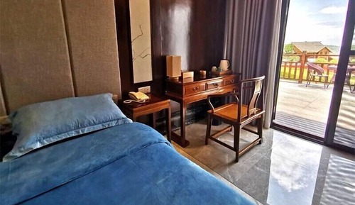 Habitación Elite con 1 cama doble o 2 individuales