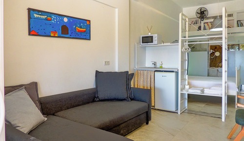 Suite estudio familiar, vistas parciales al mar