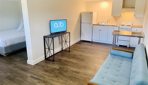 Habitación ejecutiva, cocina básica, planta ejecutiva
