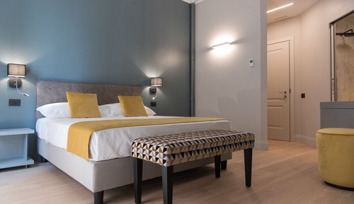 Habitación triple Deluxe, varias camas