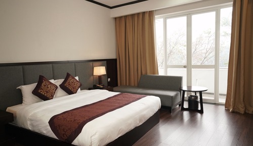 Habitación superior con 1 cama doble o 2 individuales