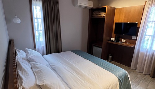 Habitación panorámica con 2 camas individuales, vistas a la ciudad