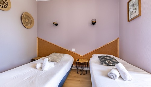 Habitación con 2 camas individuales
