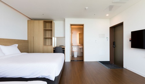Habitación triple Deluxe, vistas al mar, junto a la playa