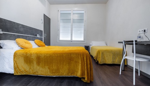 Habitación familiar, varias camas
