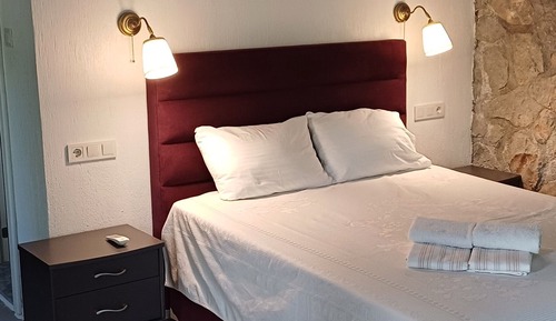Habitación triple Club, vistas al jardín