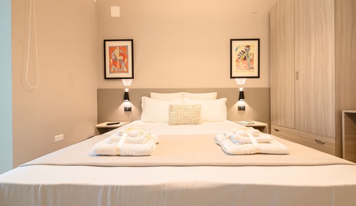 Habitación superior con 1 cama doble o 2 individuales