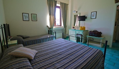 Habitación triple, vistas al jardín
