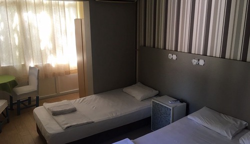 Habitación triple, vistas al jardín
