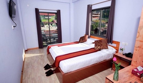 Habitación superior con 1 cama doble o 2 individuales