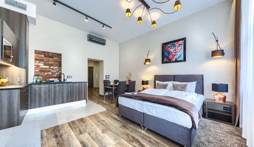 Estudio Deluxe, 1 cama de matrimonio con sofá cama, vistas a la ciudad