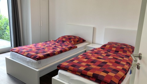 Habitación económica con 2 camas individuales, baño compartido