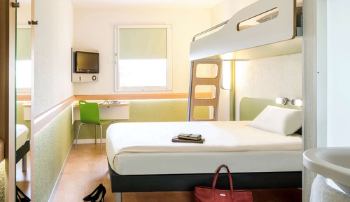 Habitación triple, varias camas