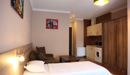 Habitación triple familiar, varias camas, vistas a la ciudad