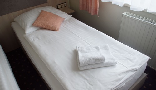 Habitación estándar con 1 cama doble o 2 individuales