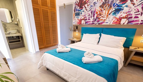 Habitación cuádruple familiar, vistas al jardín