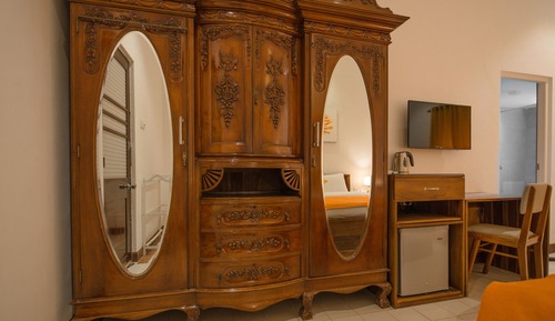 Habitación triple Deluxe, varias camas