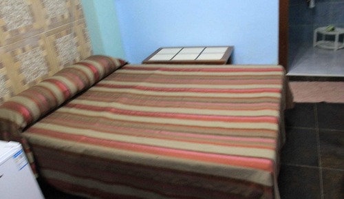 Habitación triple Deluxe, varias camas