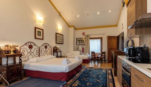 Suite estudio familiar, vistas al jardín