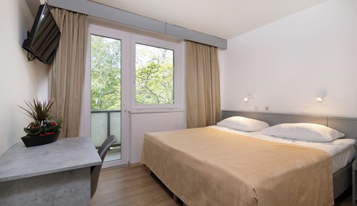 Habitación superior con 1 cama doble o 2 individuales