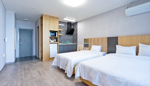 Habitación Business con 2 camas individuales, cocina, vistas al mar
