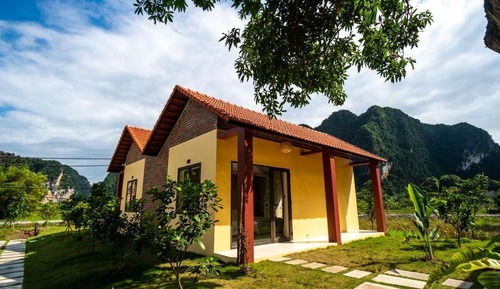 Habitación triple superior, vistas al jardín