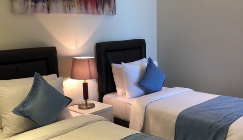 Suite Deluxe, 3 habitaciones, vistas parciales al mar
