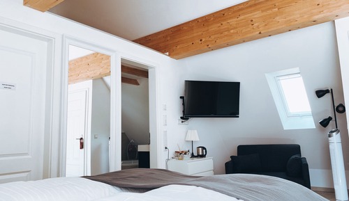 Suite Deluxe, baño privado (mit Schlafsessel)