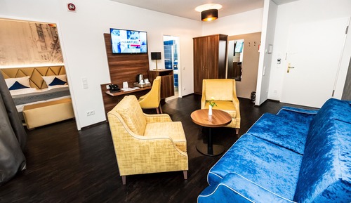 Suite, varias camas, balcón (with Sofabed)