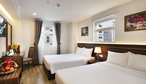 Habitación triple Deluxe, vistas parciales al mar