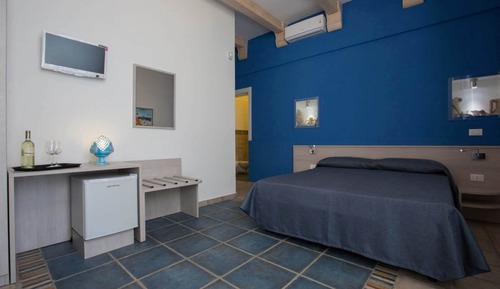 Habitación familiar, varias camas