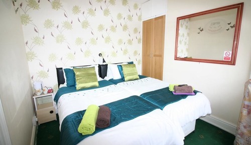 Habitación estándar con 1 cama doble o 2 individuales