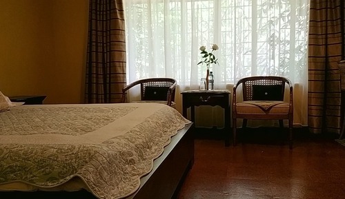 Habitación superior, 1 cama de matrimonio, vistas al jardín, planta baja