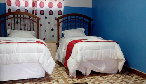 Habitación con 2 camas individuales
