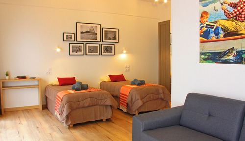 Habitación triple, varias camas