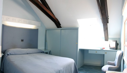 Habitación estándar con 1 cama doble o 2 individuales