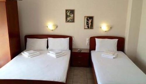 Habitación triple, vistas al mar
