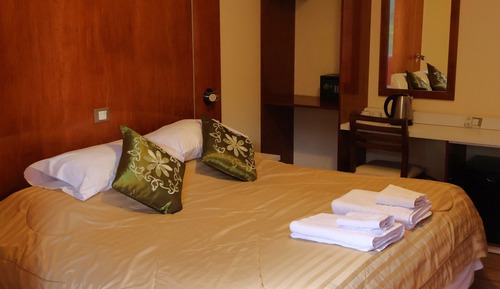 Habitación estándar con 1 cama doble o 2 individuales