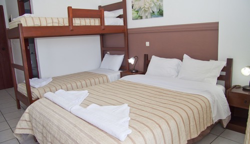 Habitación triple, vistas al mar