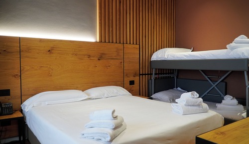 Quadrupla Premium con Divano Letto