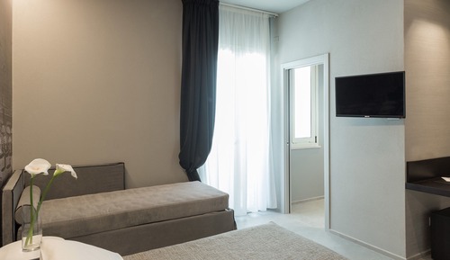 Habitación triple Deluxe, vistas parciales al mar