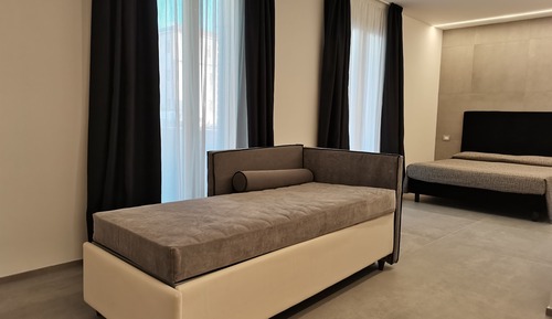Habitación triple junior, vistas parciales al mar